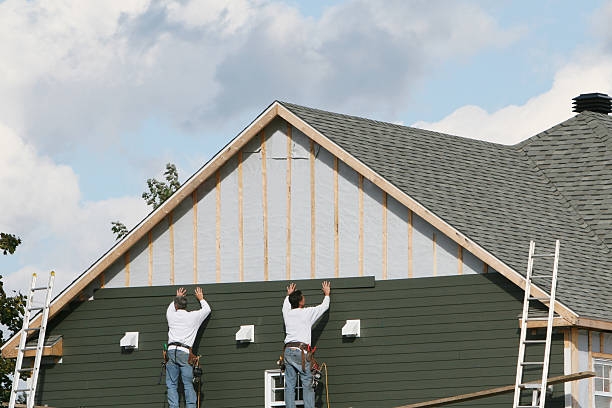 Professional Storm Damage Siding Repair technician working in Adamstown, MD